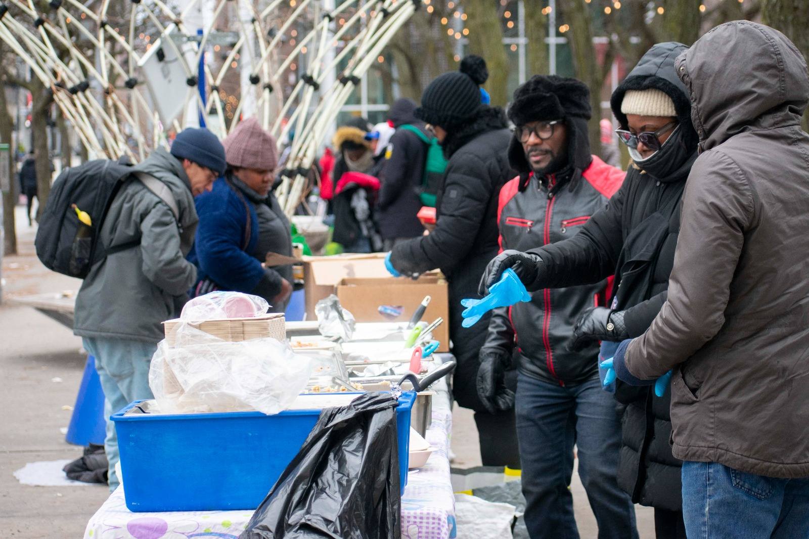 Volunteers serving warm food